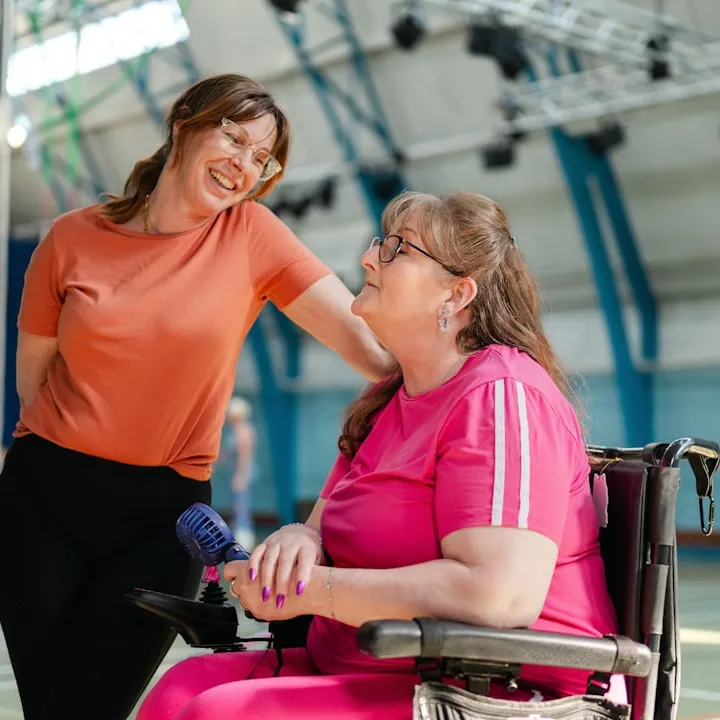 A support worker helping someone with everyday tasks at home